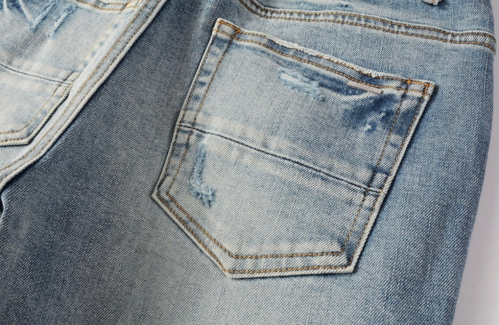 Men’s Mike AMIRI Distressed Light Blue Jeans