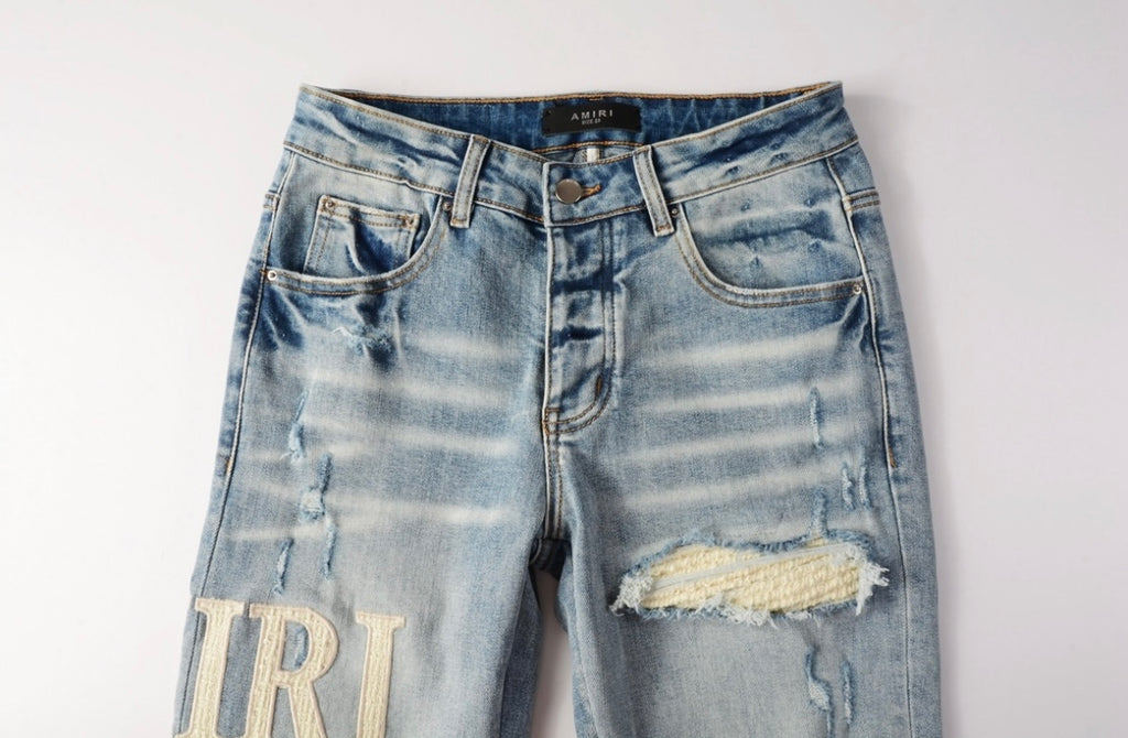 Men’s Mike AMIRI Distressed Light Blue Jeans