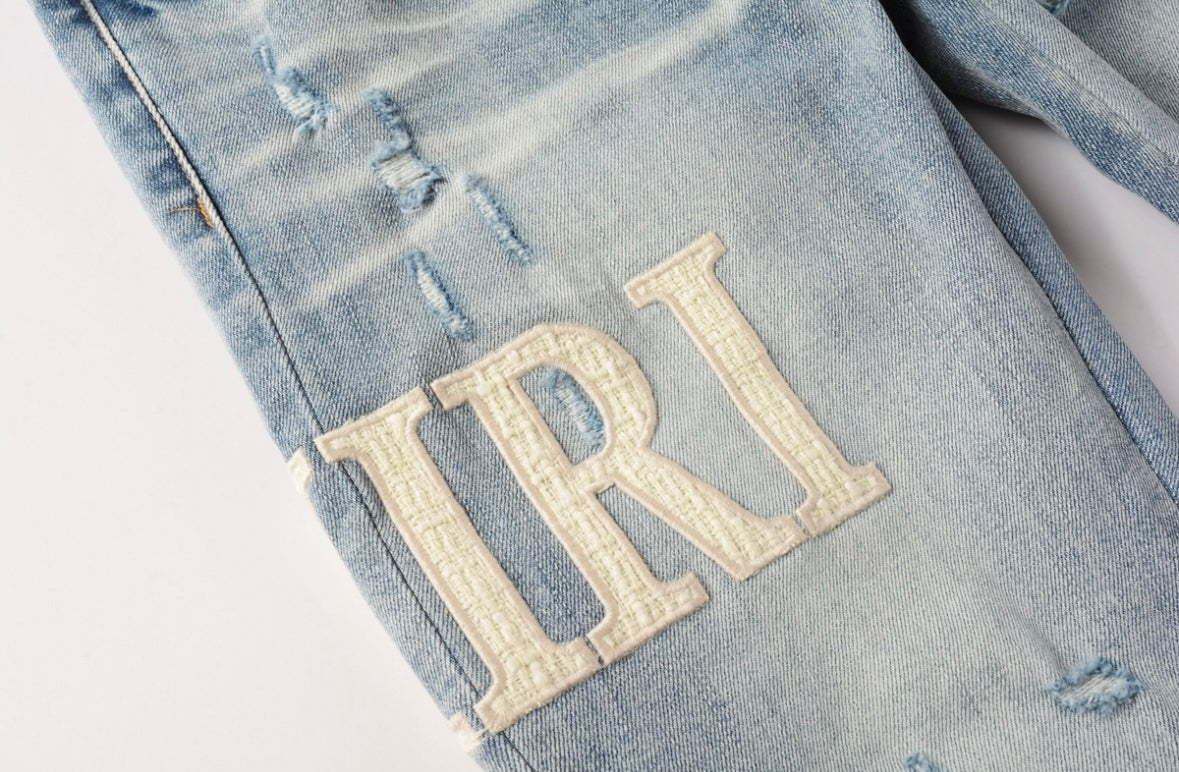 Men’s Mike AMIRI Distressed Light Blue Jeans