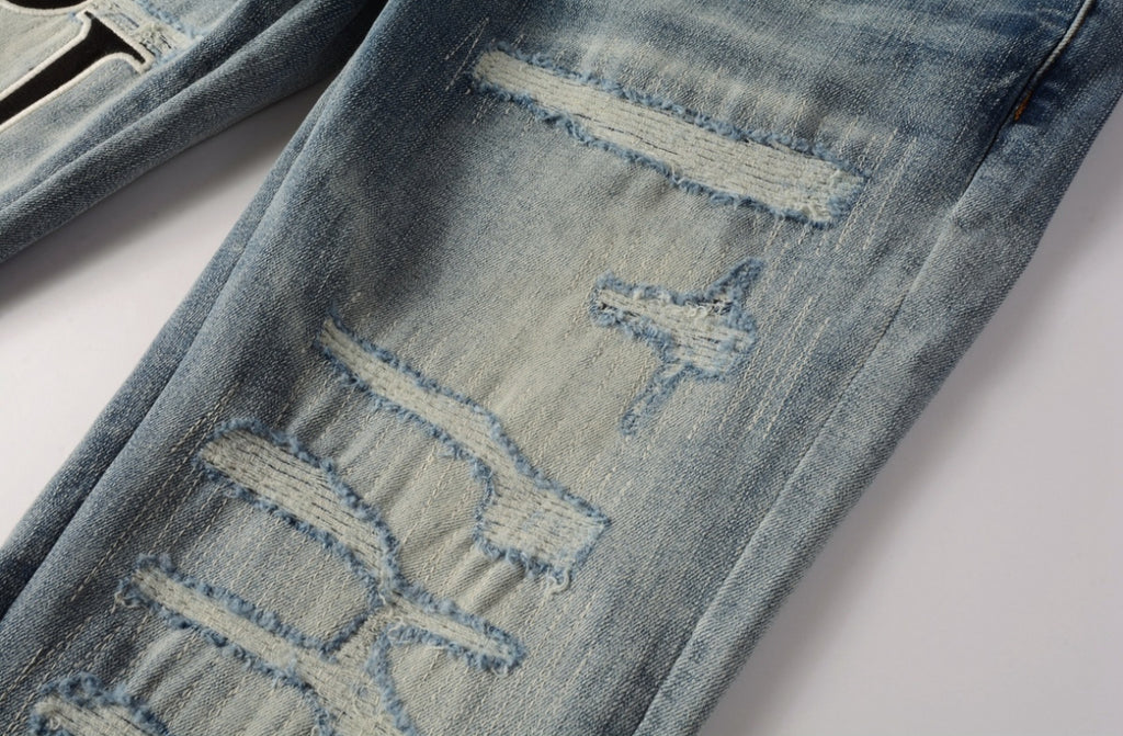 Men’s Mike AMIRI Distressed Staggered Logo Light Blue Jeans