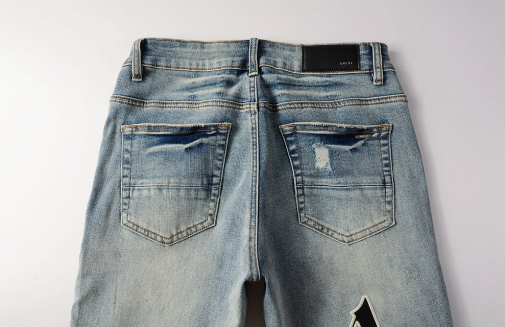 Men’s Mike AMIRI Distressed Staggered Logo Light Blue Jeans