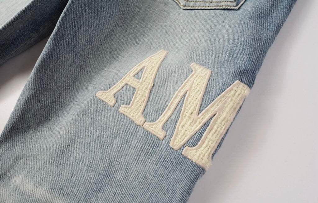 Men’s Mike AMIRI Distressed Light Blue Jeans