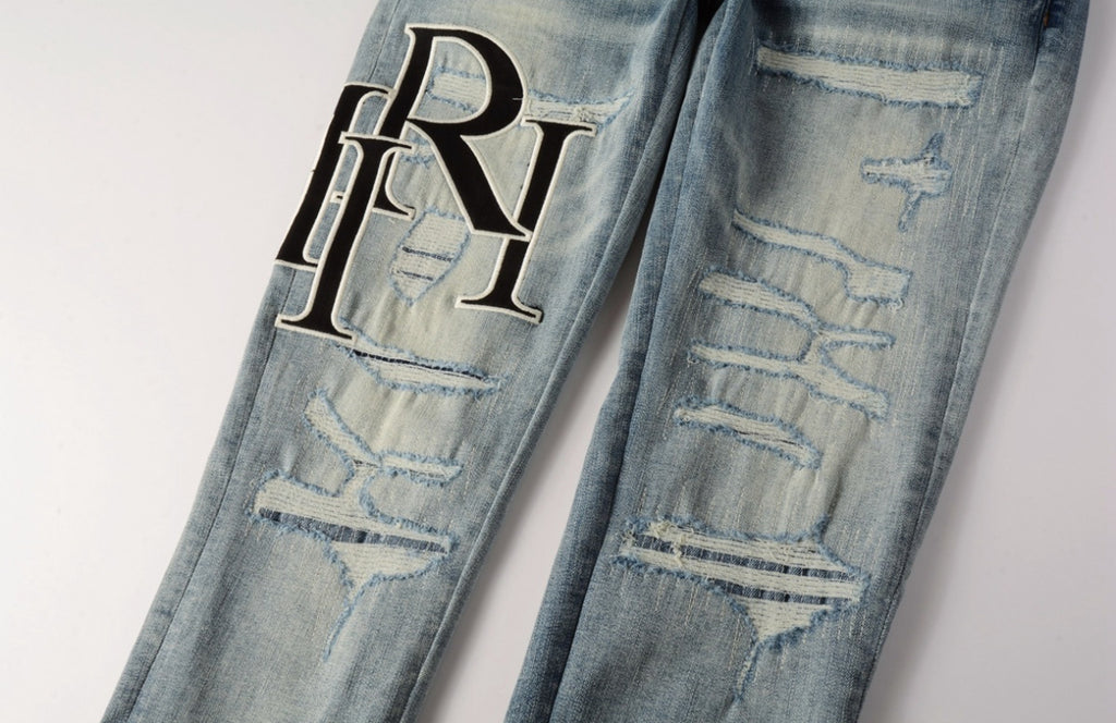 Men’s Mike AMIRI Distressed Staggered Logo Light Blue Jeans