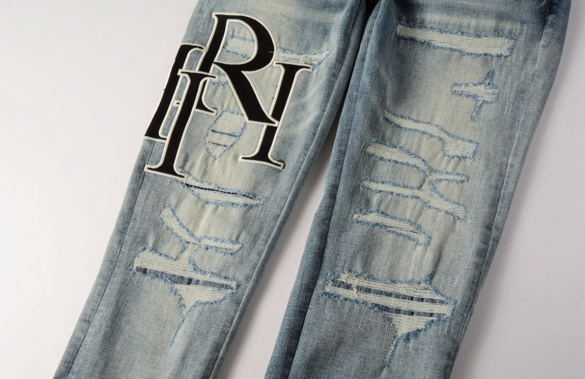 Men’s Mike AMIRI Distressed Staggered Logo Light Blue Jeans